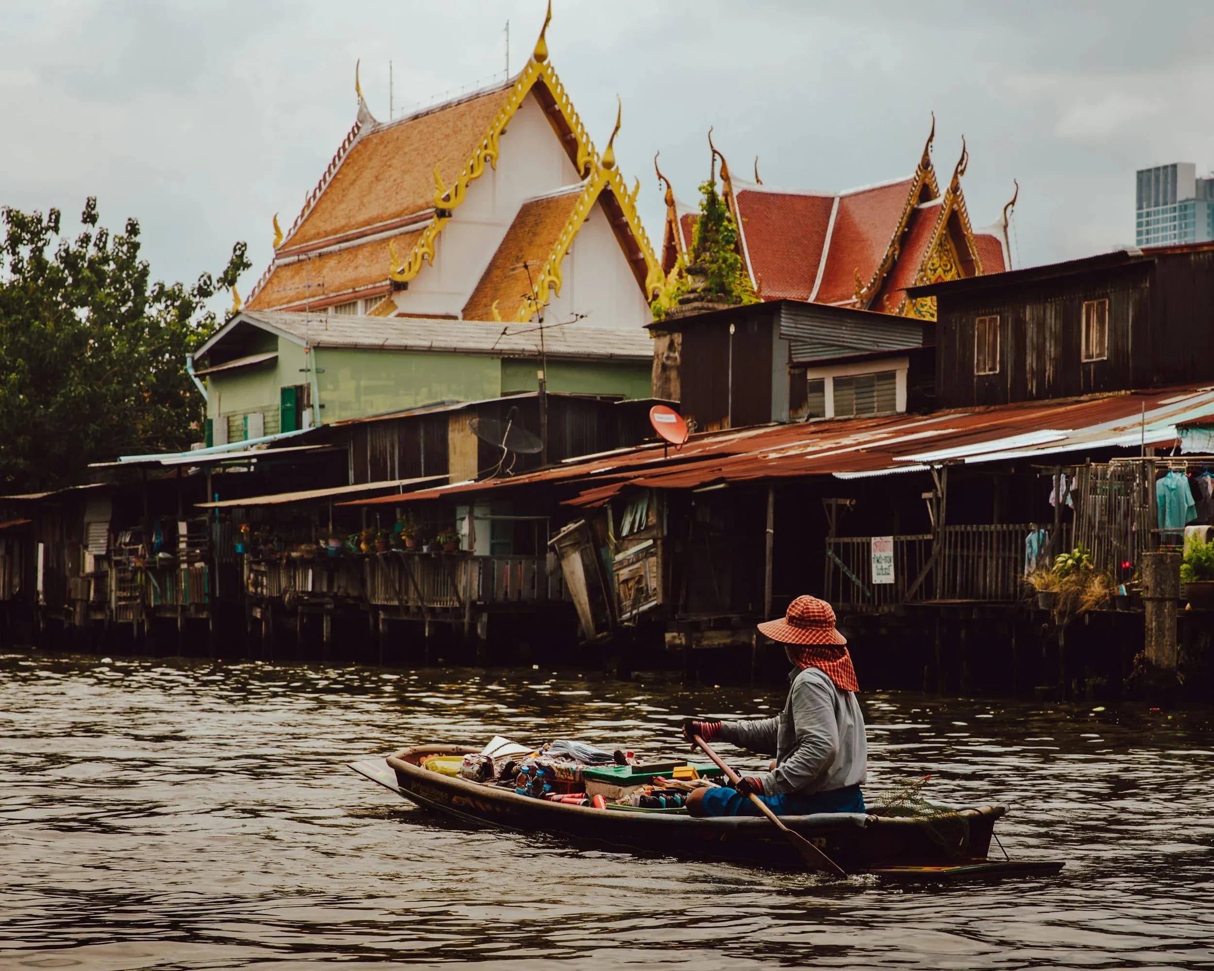 A river village in Thailand, one stop on the family's travels